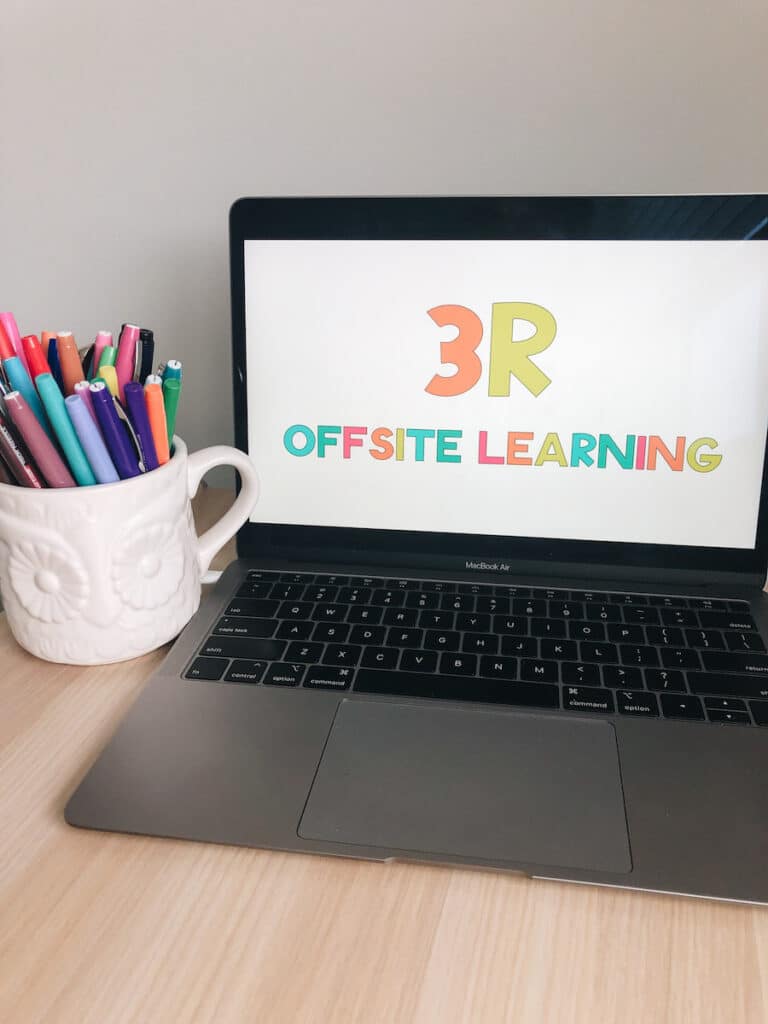 Photo of owl mug with pens and laptop displaying "3R offsite learning" text