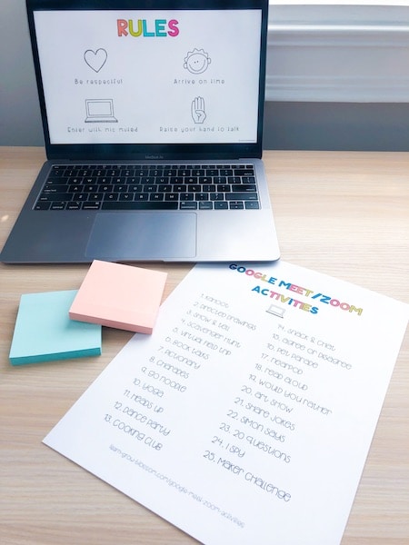 Desk showing L=laptop open showing Google Meet & Zoom rules and list of 25 zoom activities with post its