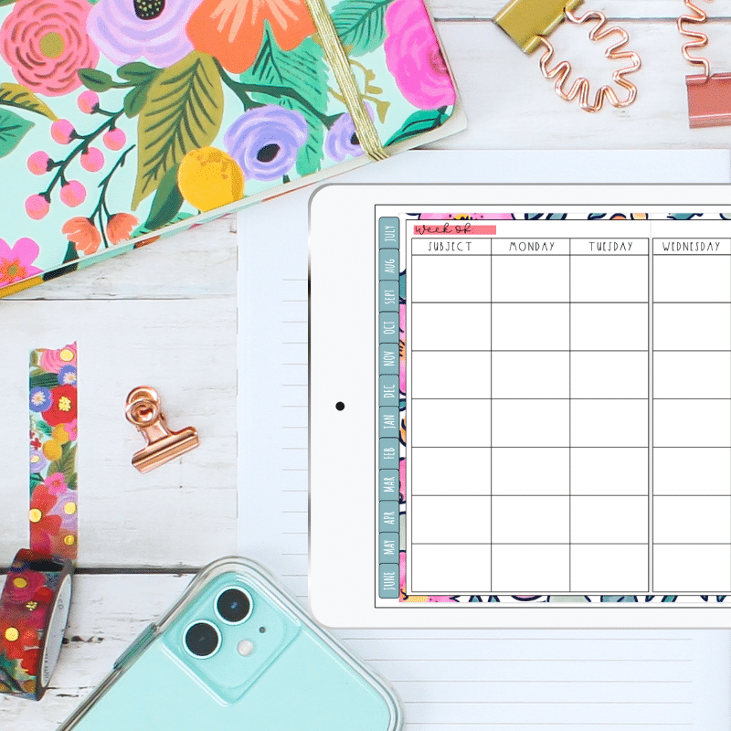 Flatlay with digital teacher planner on ipad, paper planner, washi tape, paper clips
