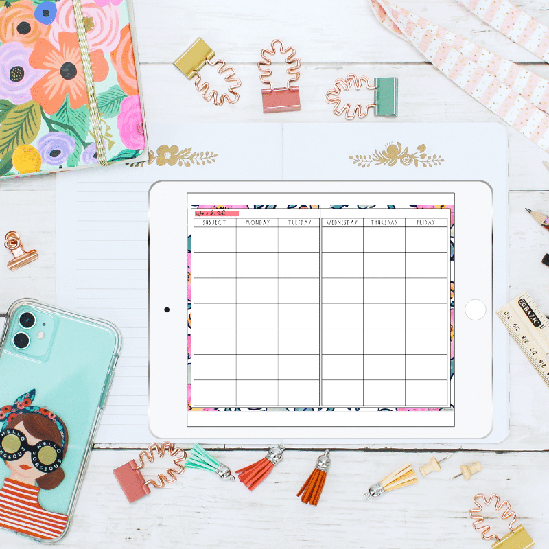 Flatlay with digital teacher planner on ipad, paper planner, iphone, ruler, pencils, lanyard