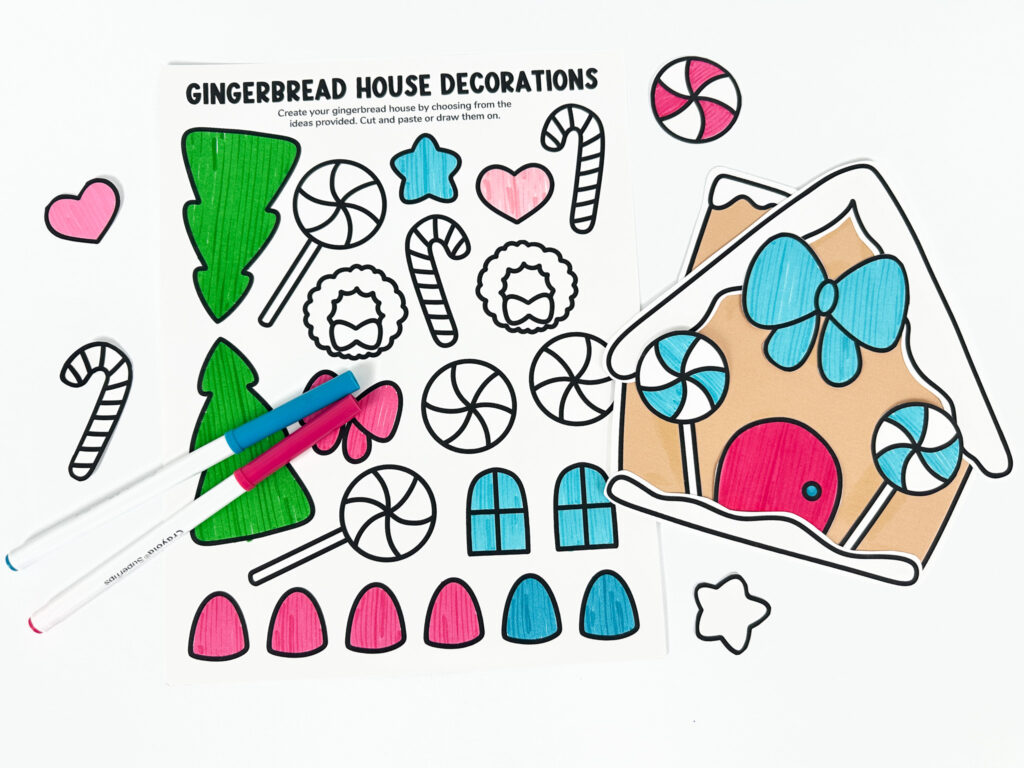 Gingerbread house craft example with the hand drawn decorations page and a blue and pink marker