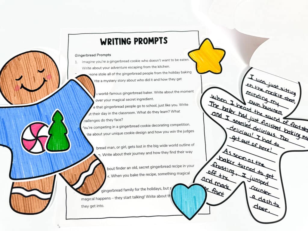 Gingerbread man craft alongside the gingerbread writing prompts and student writing sample