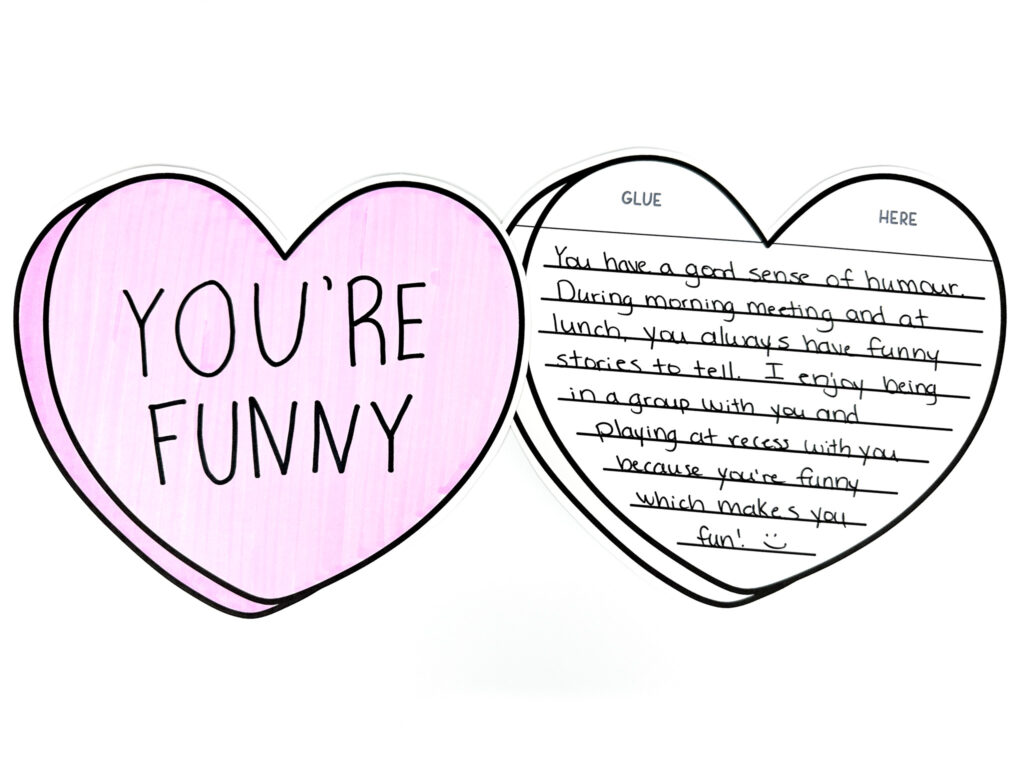 Student candy heart craft and writing example with a compliment to a classmate