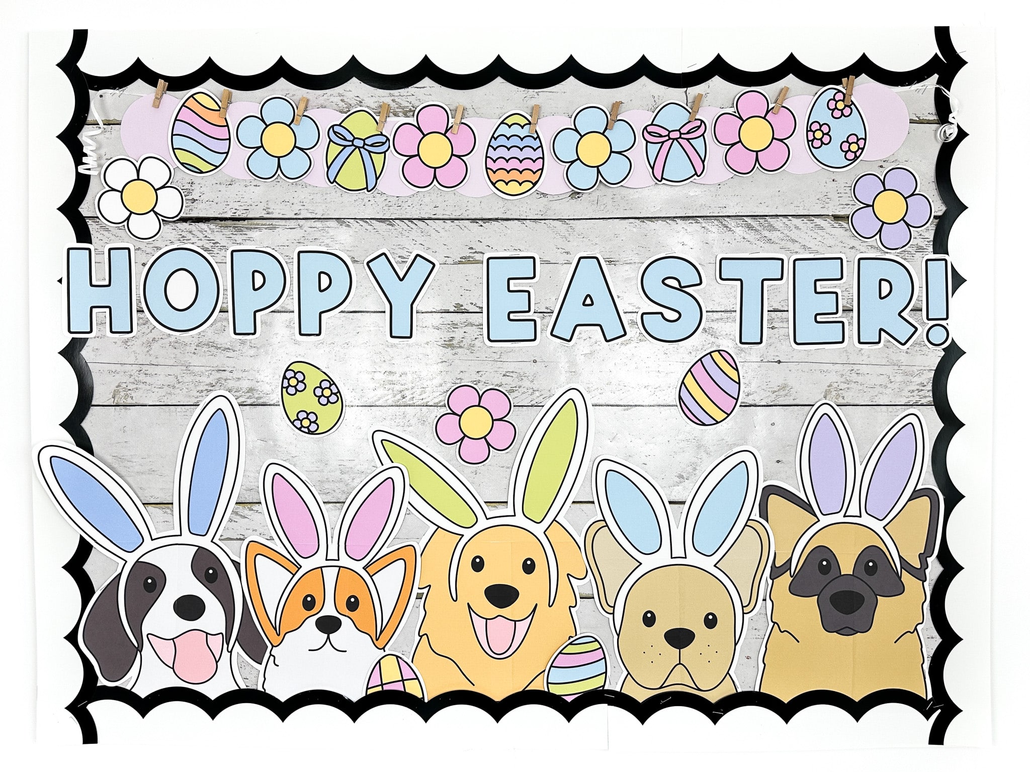 Easter bulletin board with dogs wearing bunny ears and colourful easter eggs with message "Hoppy Easter"