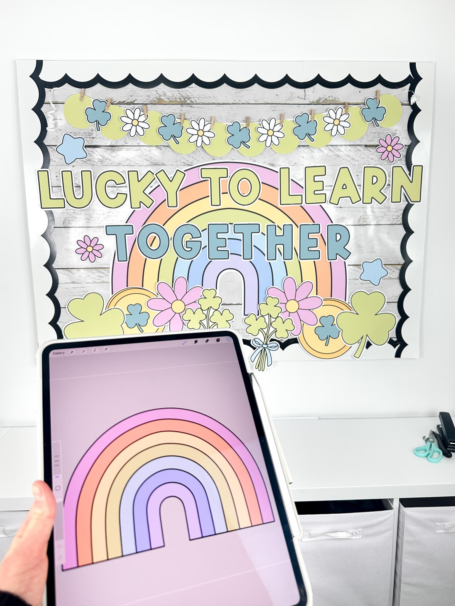 St Patrick's Day bulletin board display with the iPad drawing of the rainbow in front showing that it's hand-drawn