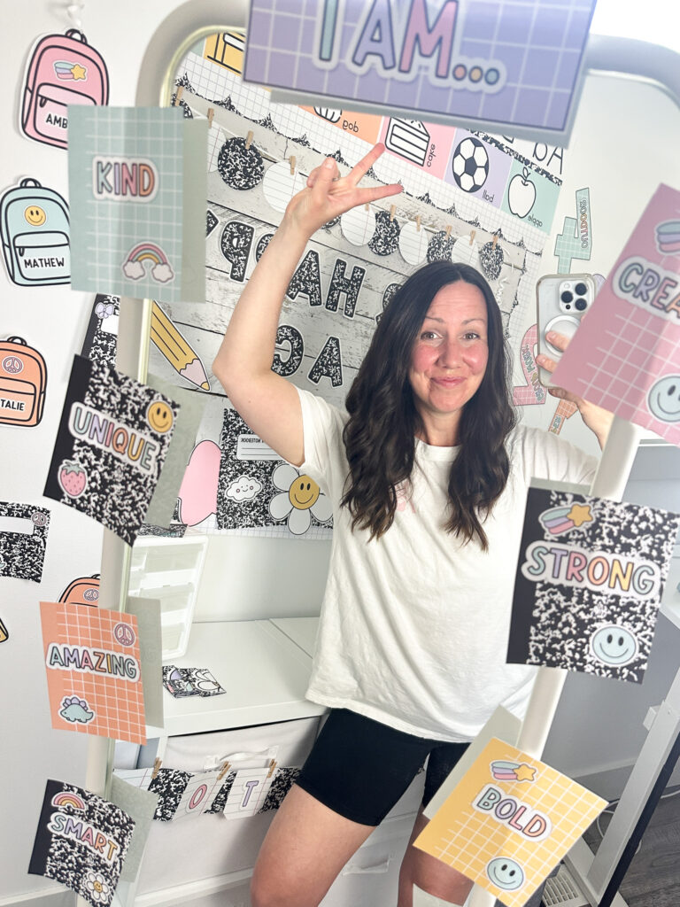 Composition notebook affirmation station selfie of teacher showing peace sign