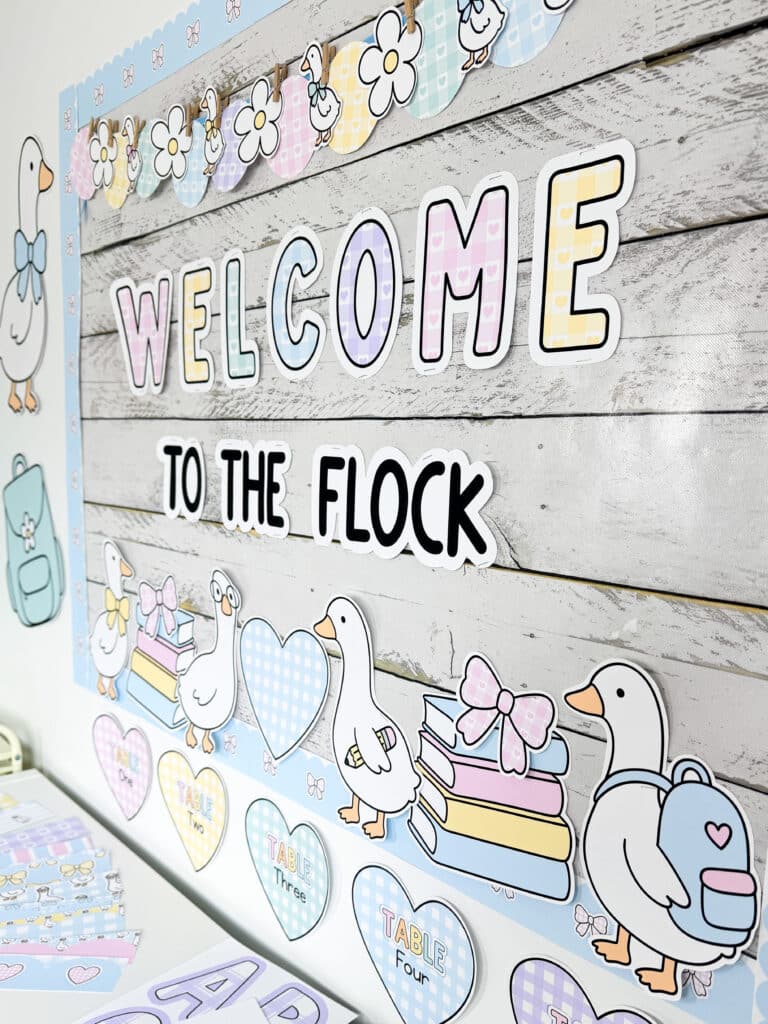 silly goose classroom decor bulletin board with geese wearing backpacks and bows and the bulletin board reads "welcome to the flock" with pastel letters